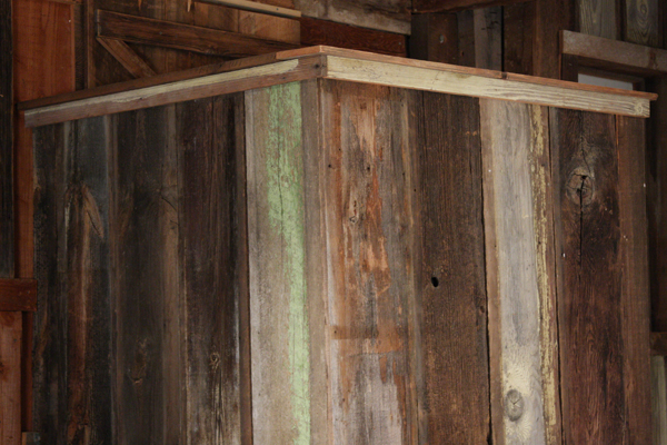 We had Chris repanel and trim out the existing Auctioneer Stand with the Reclaimed Wood from a Pear Barn in Mosier, OR