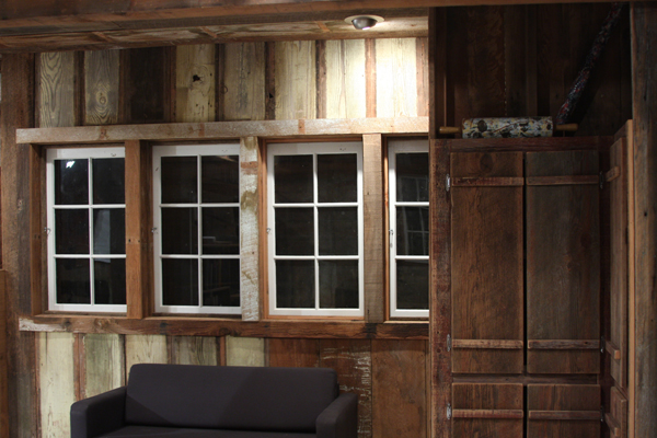 Reclaimed window score by Nell!  They overlook the shop below and make the kitchen feel like a house within a house!