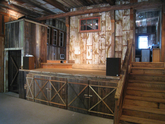 stage, art storage and kitchen